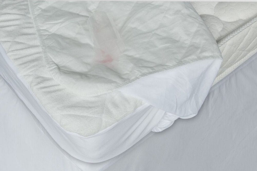 9" Deep Waterproof Bamboo Terry Cloth Crib Mattress Cover on a white background