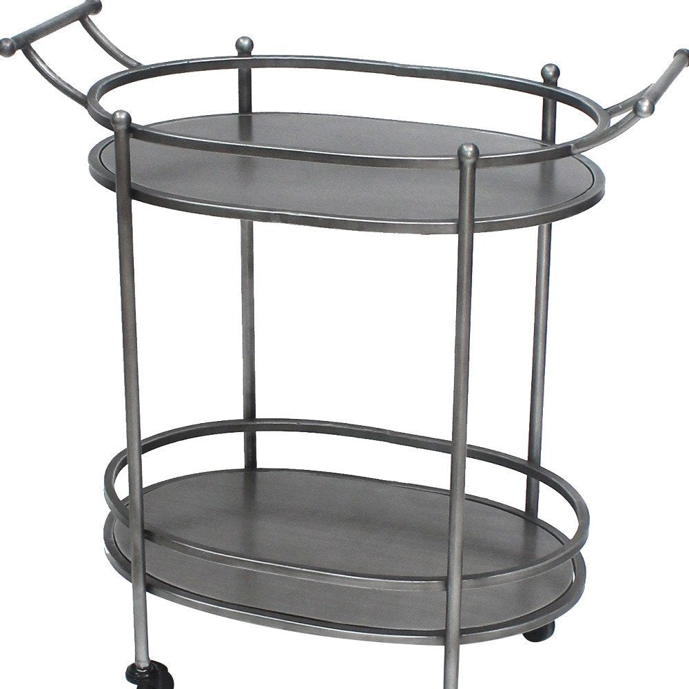 15 X 28 X 31 Bronze Antique Oval Service Cart. Kitchen cart isolated on a plain white background, in a silver finish.