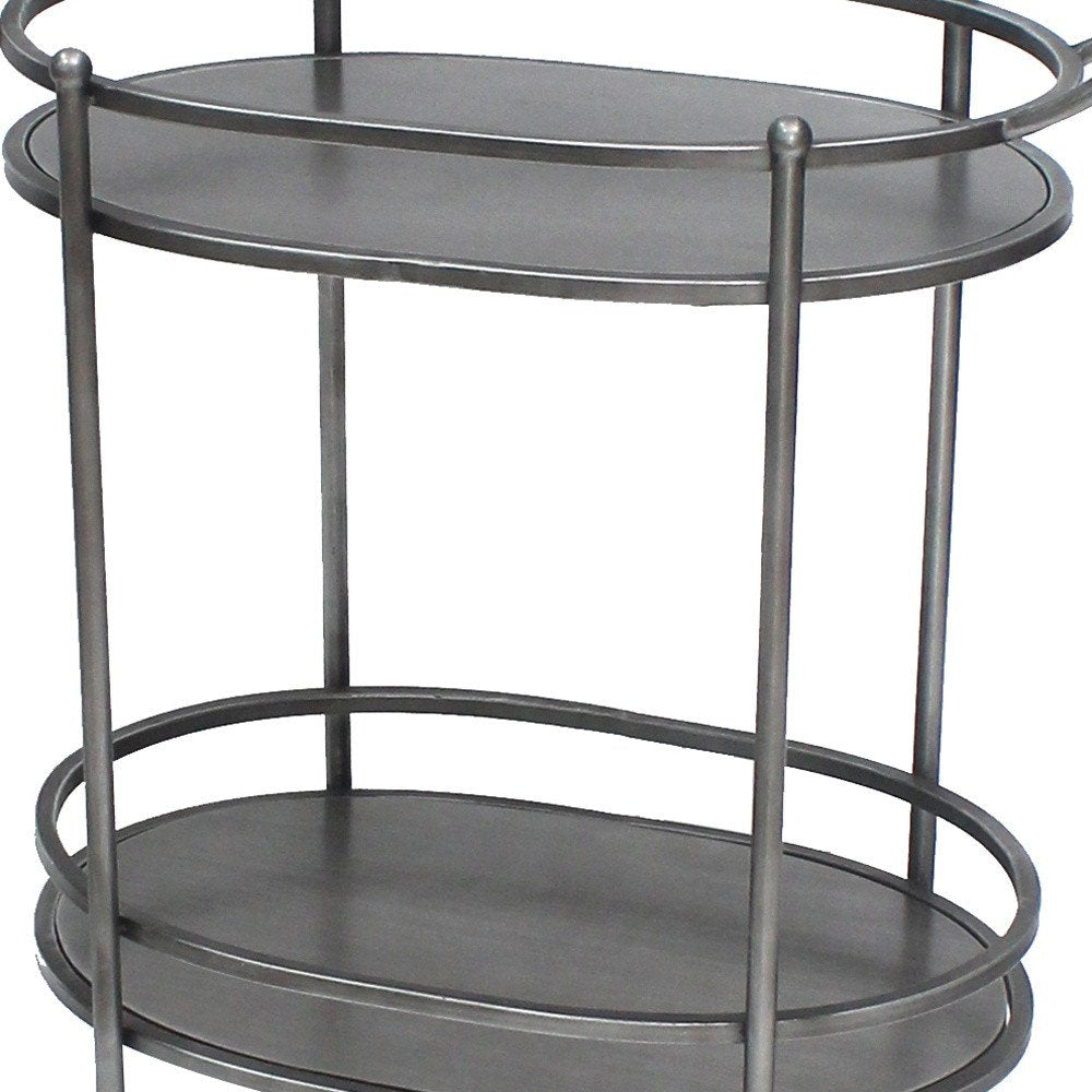 15 X 28 X 31 Bronze Antique Oval Service Cart. Kitchen cart isolated on a plain white background, showing its silver color.