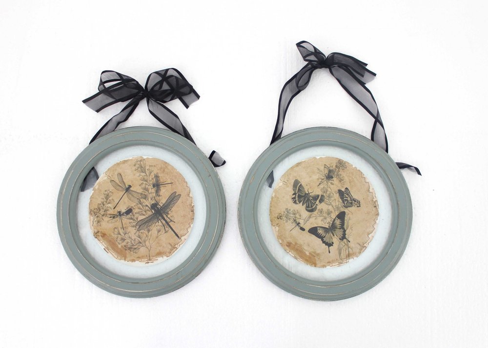 Set of Two Green And Ivory Butterfly Glass Circle on a white background