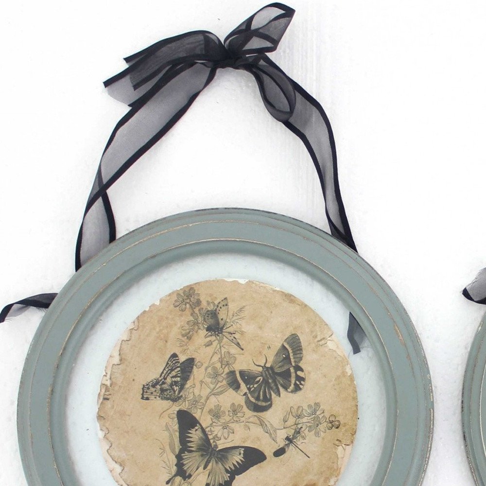 Set of Two Green And Ivory Butterfly Glass Circle on a white background