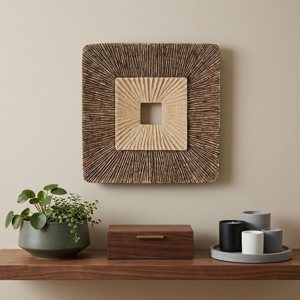 Set of Two Brown Abstract Geometric Sandstone Square Hanging Wall Decor in a home interior