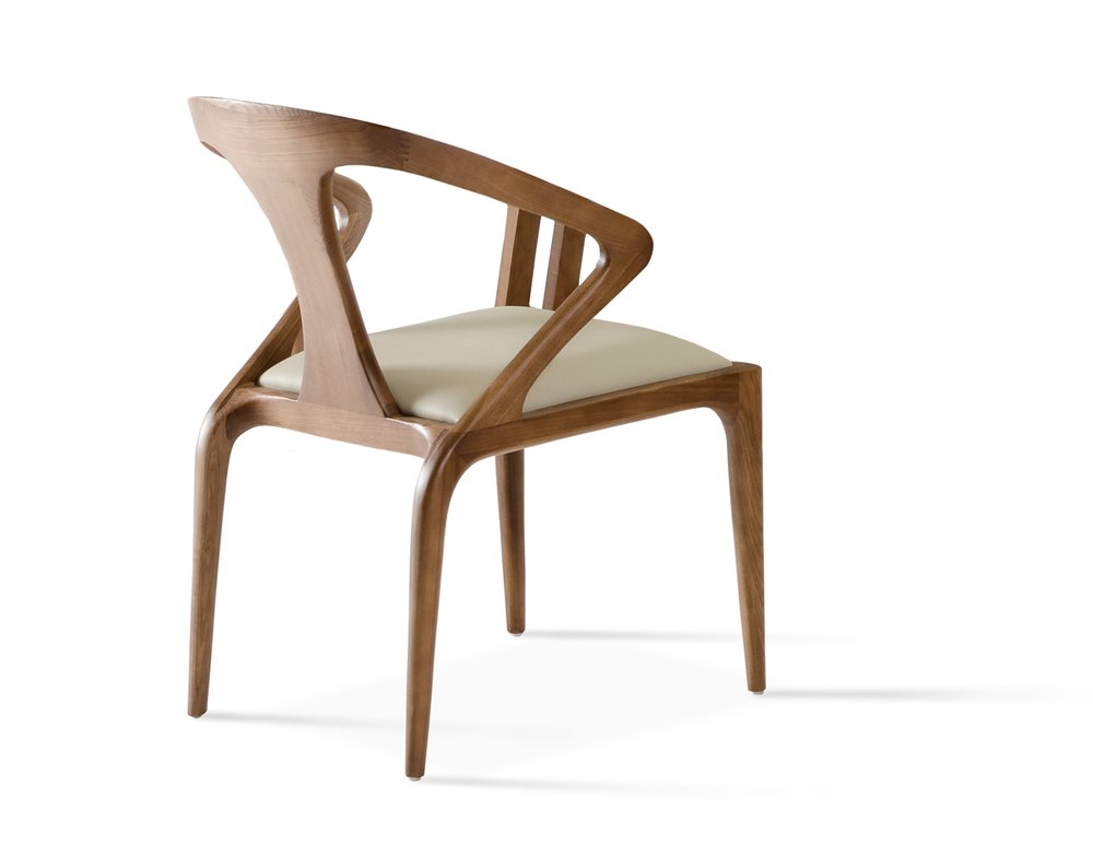 White and Brown Upholstered Faux Leather Curved Back Dining Arm Chair on a white background