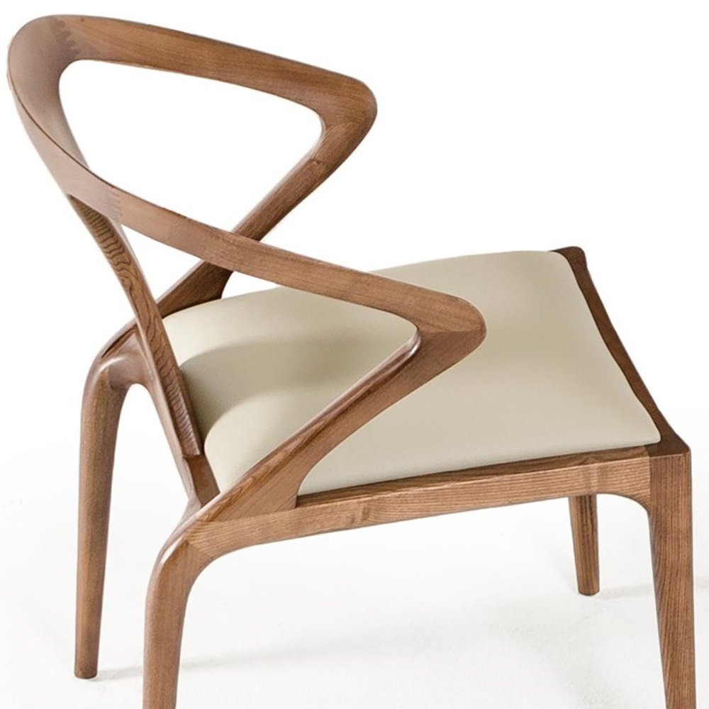 White and Brown Upholstered Faux Leather Curved Back Dining Arm Chair on a white background