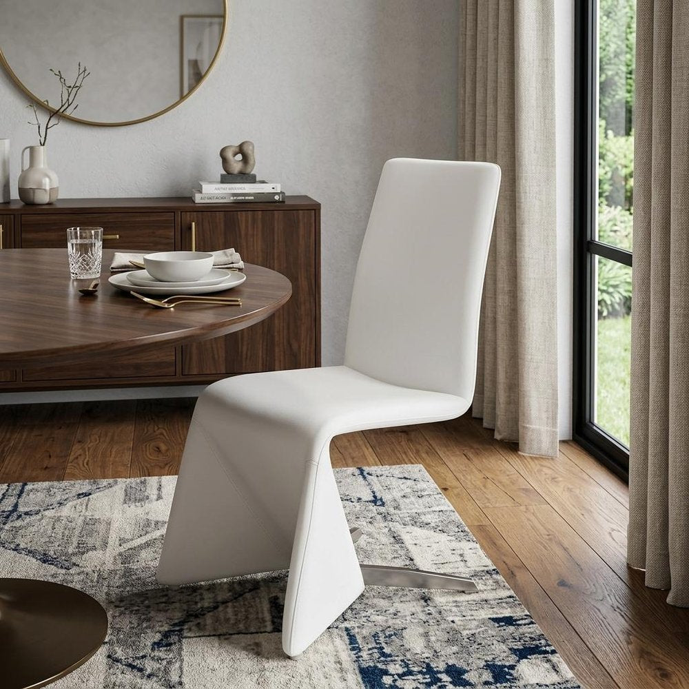 Set of Two White Upholstered Faux Leather Dining Side Chairs - 37" H x 20.5" W x 26" D in a home interior