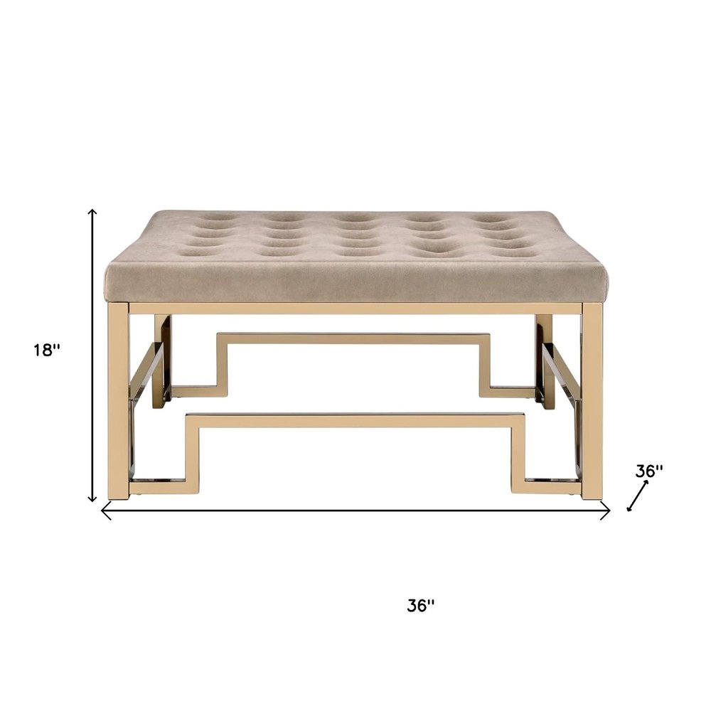 36" Champagne Polyester Tufted Cocktail Ottoman. Ottoman isolated on a plain white background, showing a tan fabric surface.