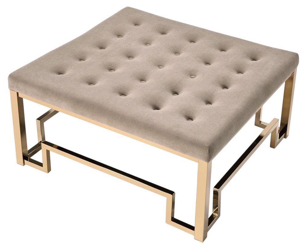 36" Champagne Polyester Tufted Cocktail Ottoman. Ottoman isolated on a plain white background, showing a tan fabric surface.