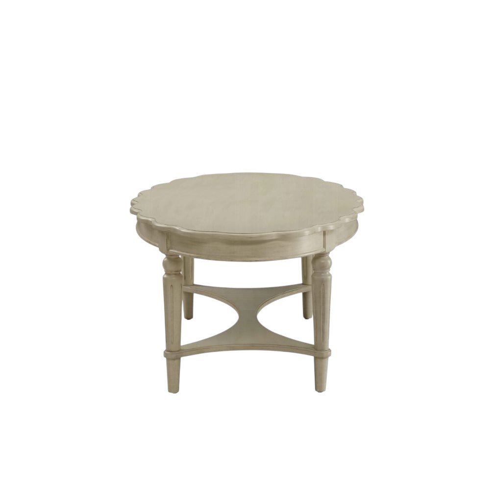 50" Antiqued White Solid Wood Oval Distressed Coffee Table. Coffee table isolated on a plain white background, in a white wood finish.