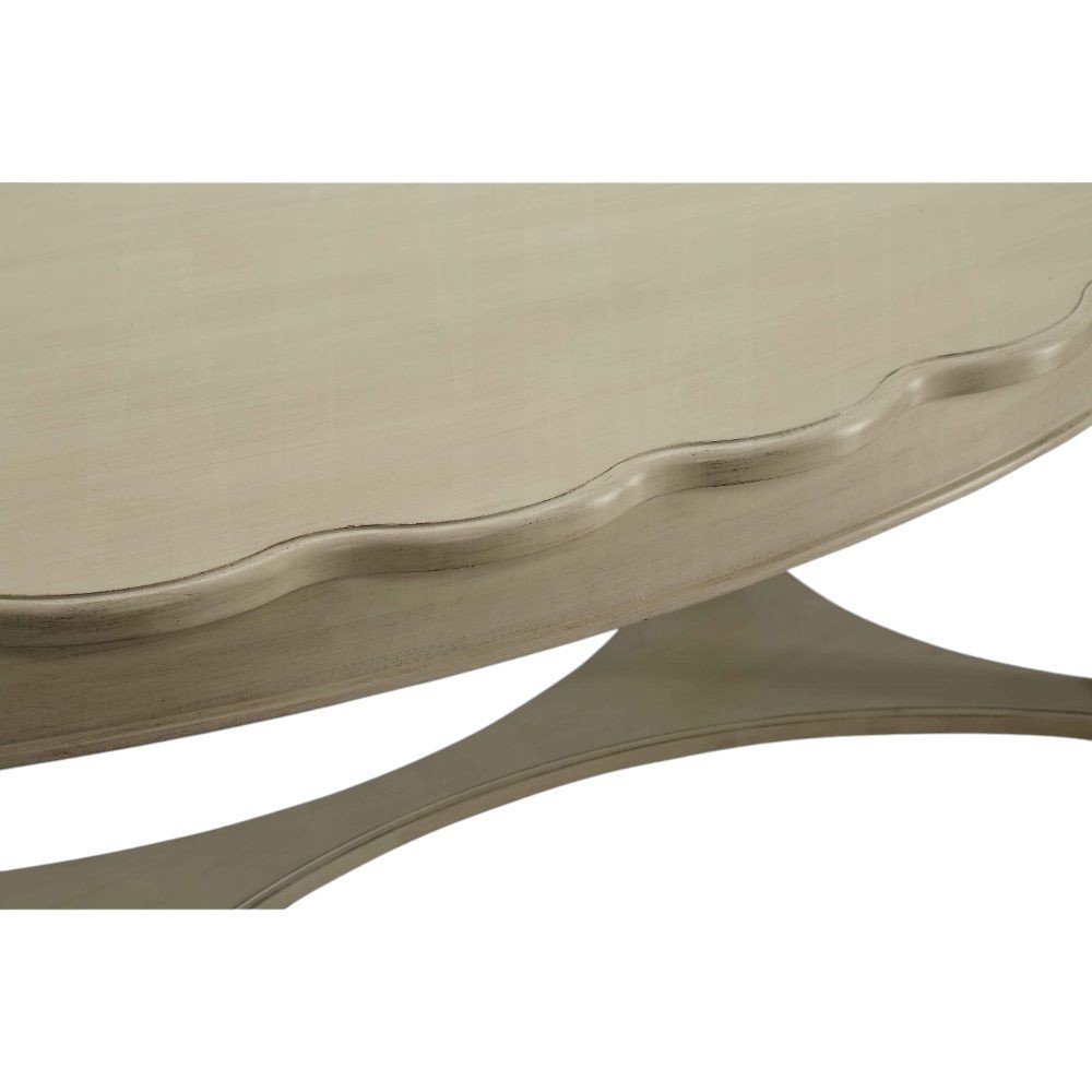 50" Antiqued White Solid Wood Oval Distressed Coffee Table. Coffee table isolated on a plain white background, showing a wood surface.
