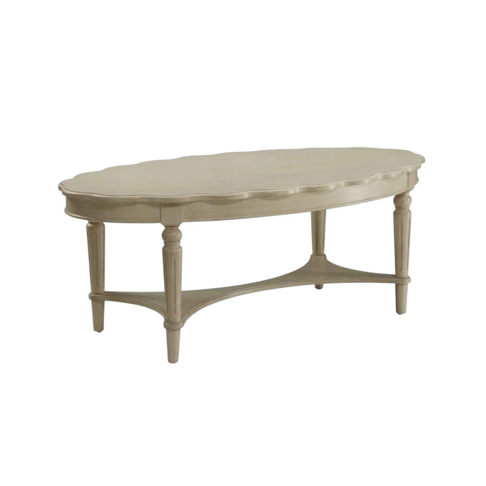 50" Antiqued White Solid Wood Oval Distressed Coffee Table. Coffee table isolated on a plain white background, finished in white wood.