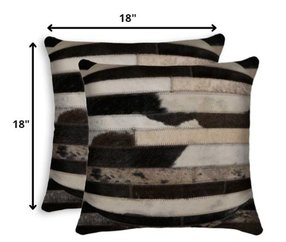 Set of Two Brown and Black Cowhide Throw Pillow on a white background