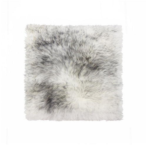 Gray genuine sheepskin chair pad with a fluffy texture on a white background.