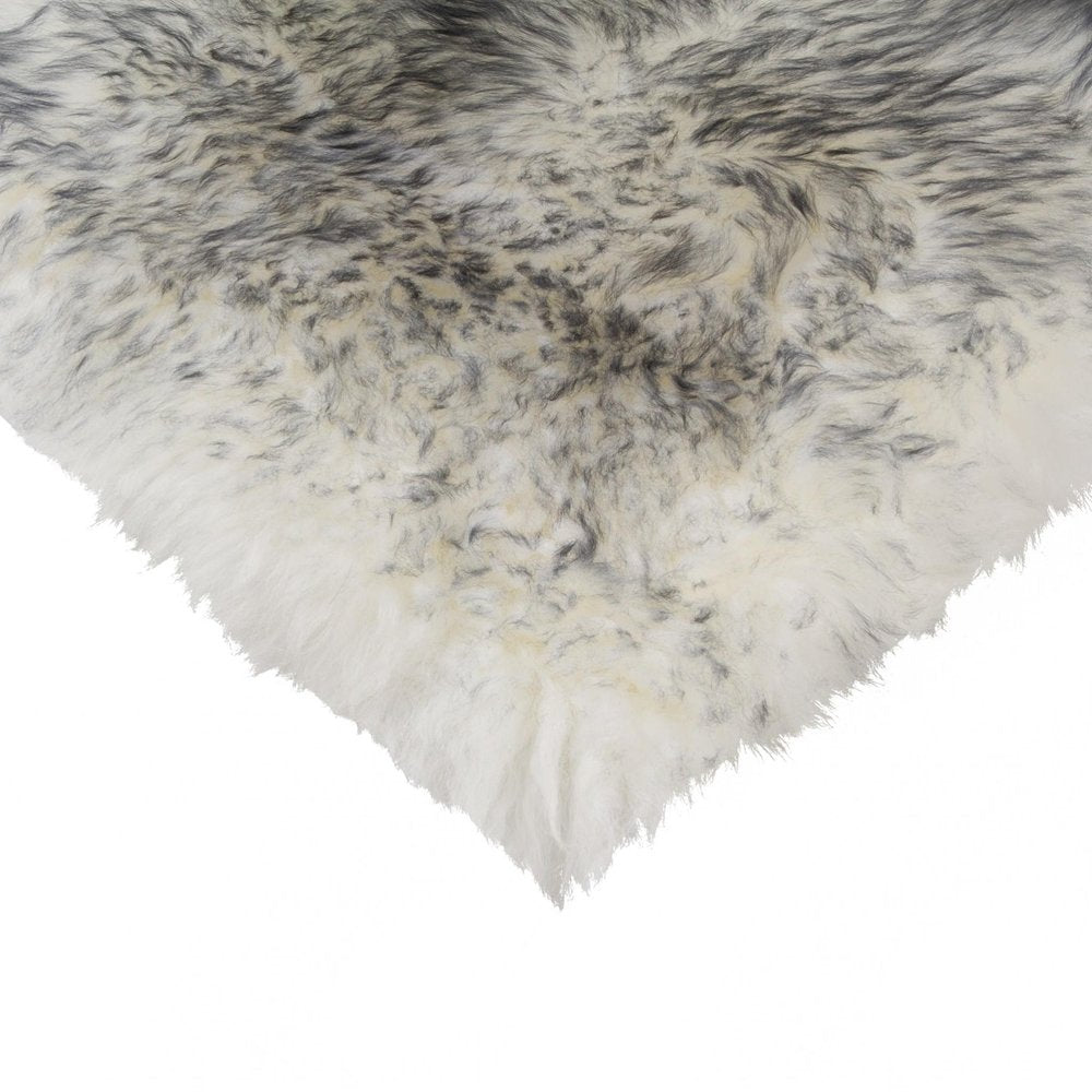17" X 17" Gray Genuine Sheepskin Chair Pad. Seat cushion isolated on a plain white background, showing its gray color.