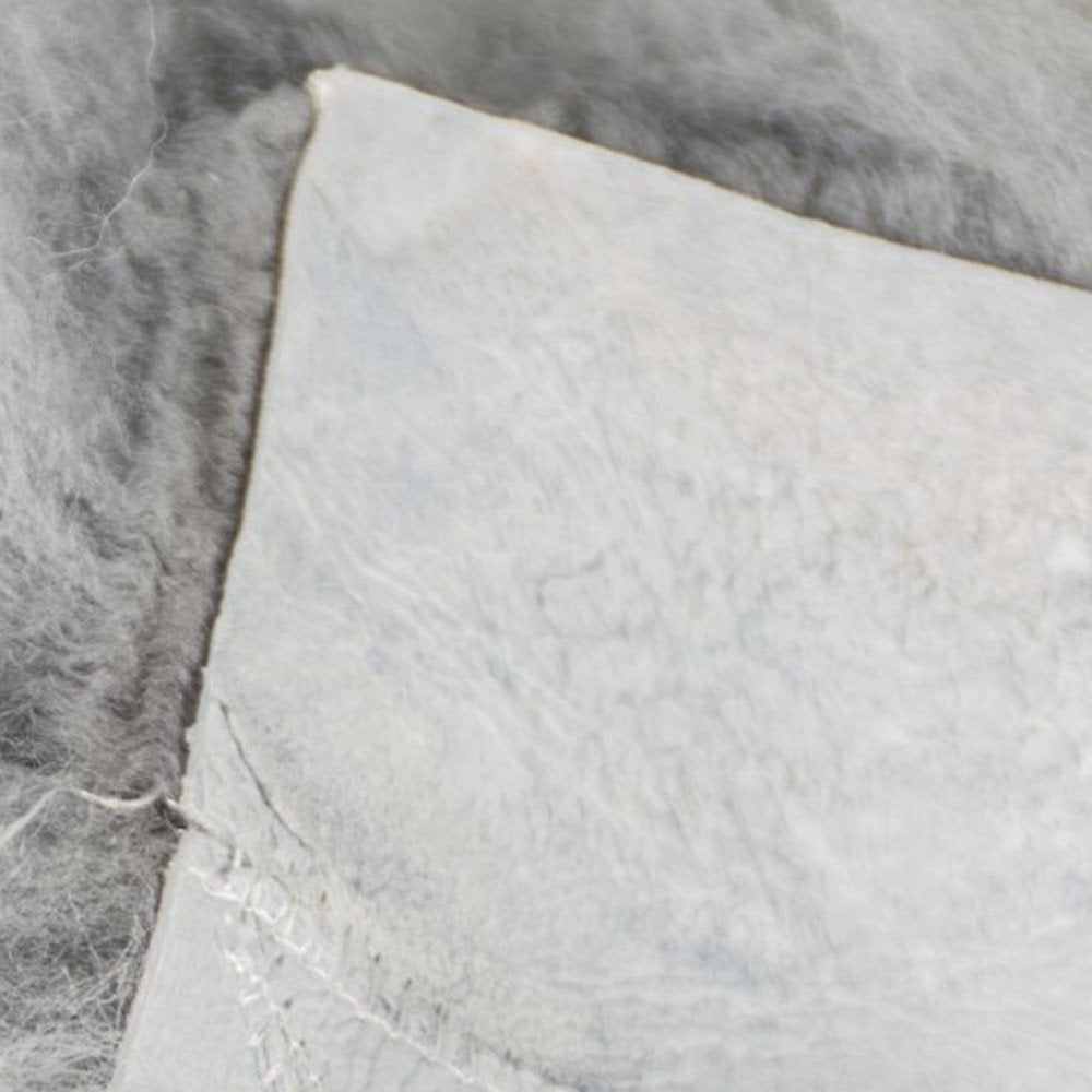Detail view of 17" X 17" Gray Synthetic Solid Color Pad, filling the frame with the gray texture.
