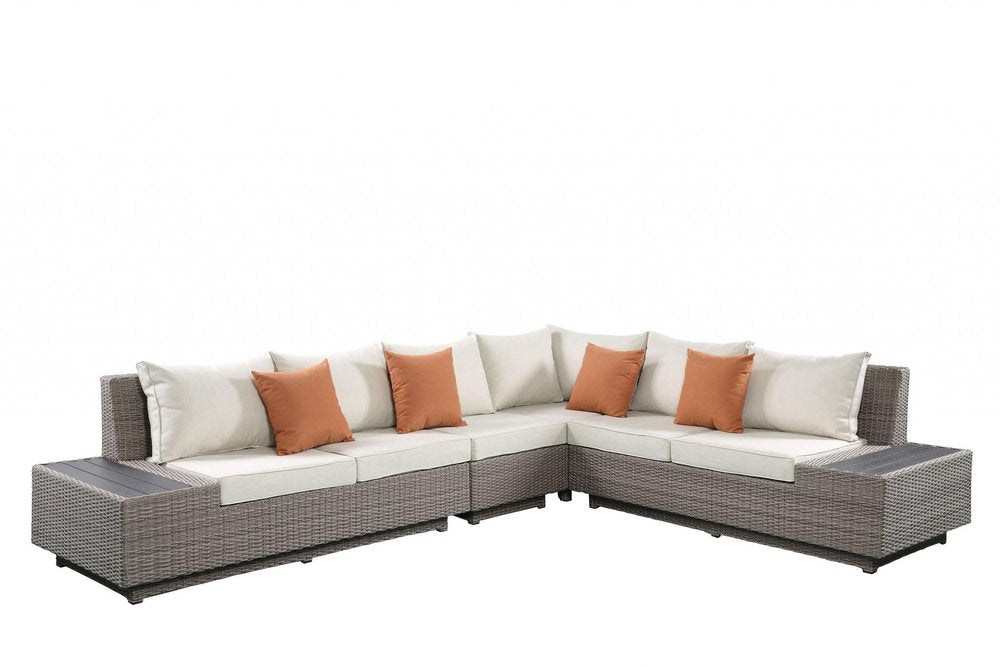 Beige Polyester Modular L Shaped Four Piece With Console And Toss Pillows on a white background