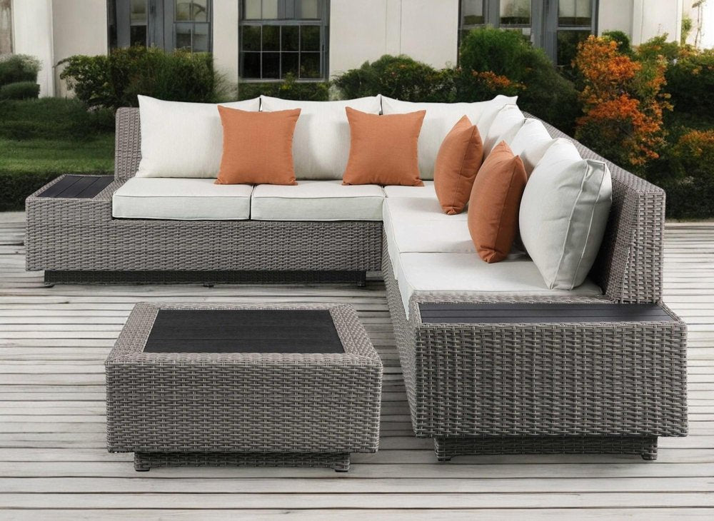Beige Polyester Modular L Shaped Four Piece With Console And Toss Pillows on a white background