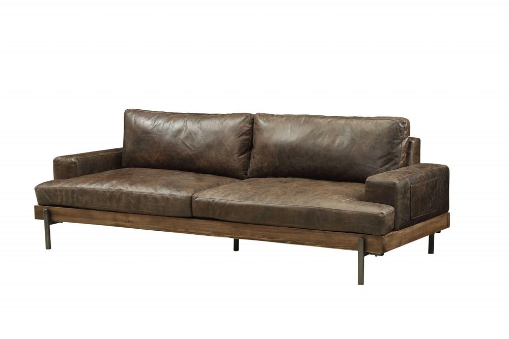 Chocolate top grain leather sofa with a rustic wood frame and black metal legs, shown against a white background.