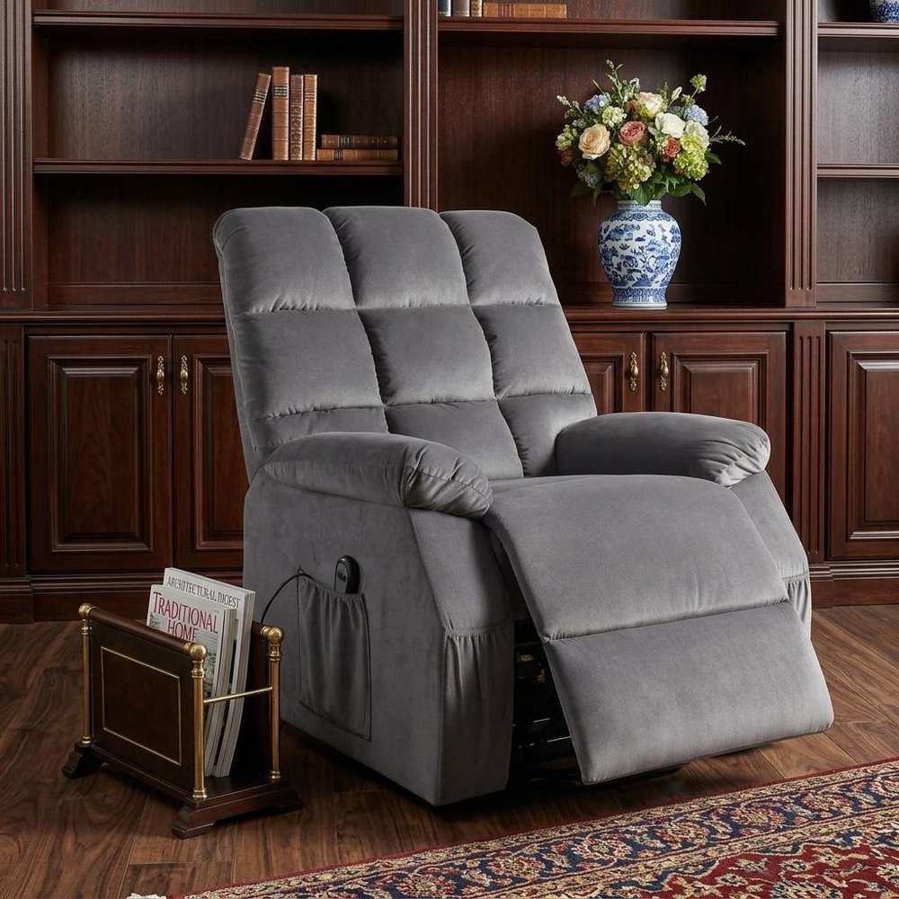 34" Gray Velvet Heated Massage Lift Assist Power Recliner styled in a furnished interior with a black wall on a dark wood floor.