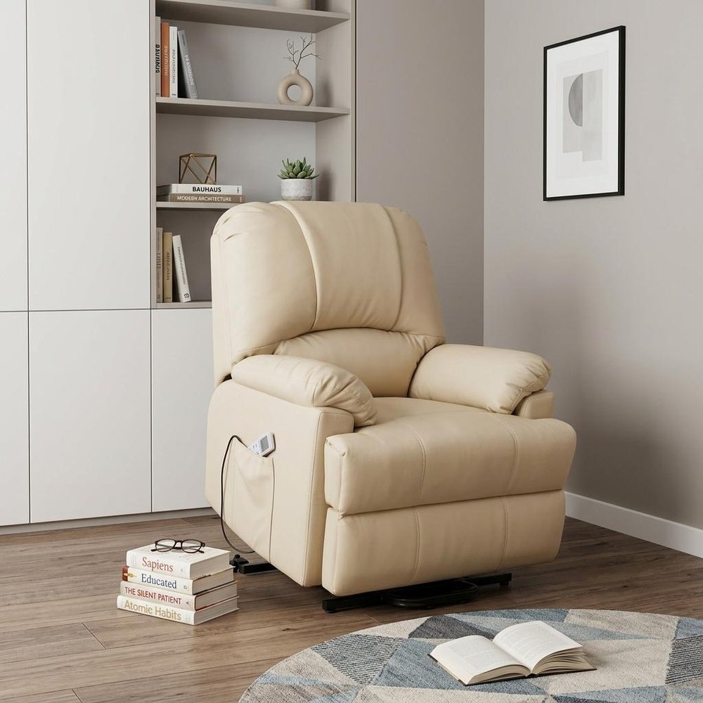 34" Beige Faux Leather Power Massage Lift Assist Recliner styled in a furnished interior with a light gray wall on a wood floor.