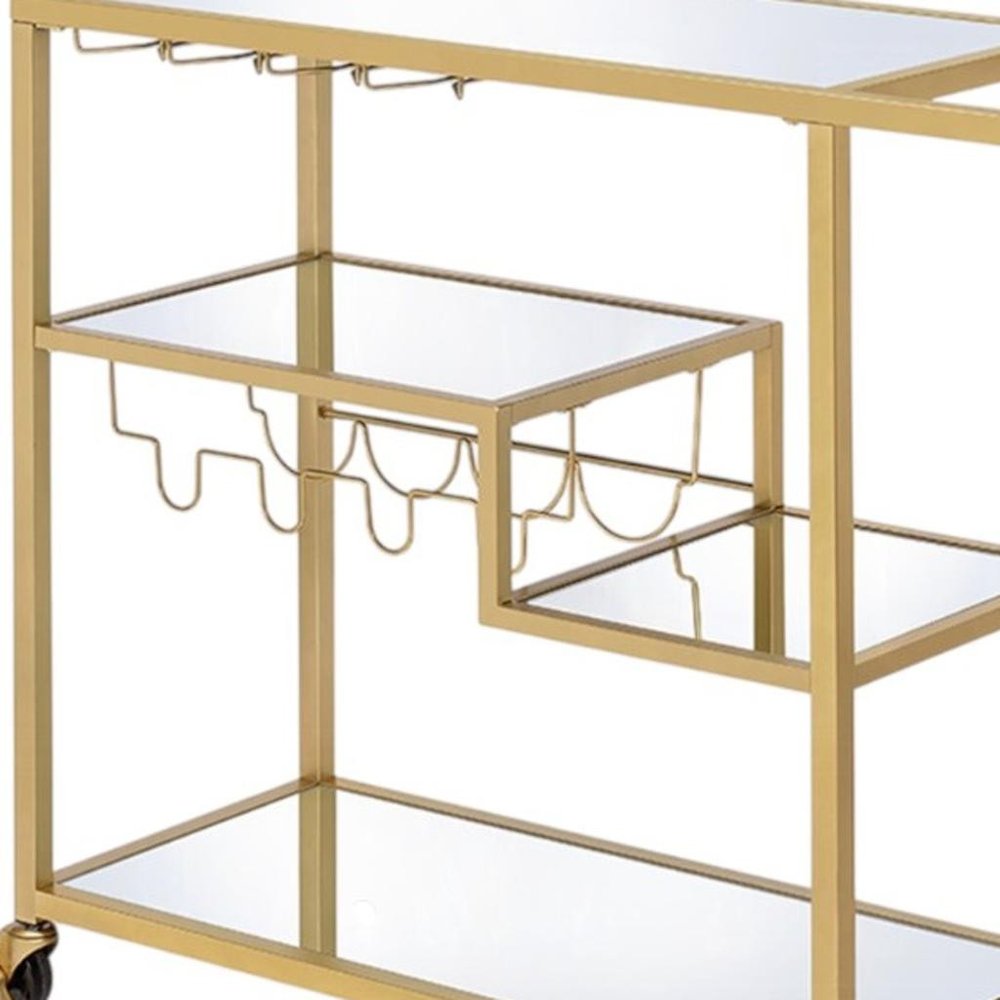 40" Clear and Gold Glass and Iron Rolling Prep Table. Kitchen cart isolated on a plain white background, finished in gold glass.