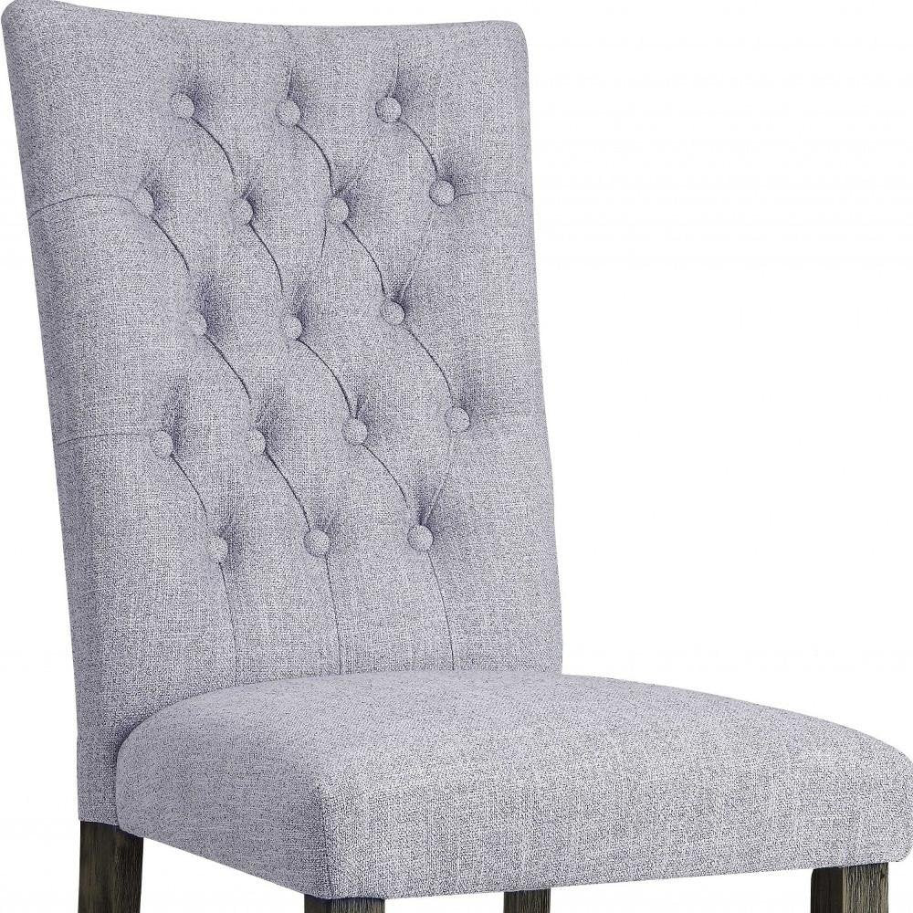 Set of Two Tufted Gray Upholstered Fabric Dining Side Chairs on a white background