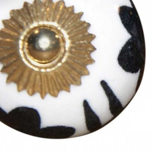 1.5" X 1.5" X 1.5" Black White And Gold Knobs 8 Pack. Cabinet knobs isolated on a plain white background, in a gold ceramic finish.