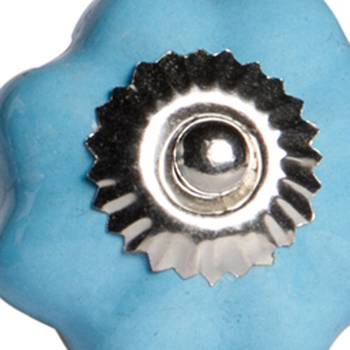 Close-up of 1.5" X 1.5" X 1.5" Glossy Navy And Silver Knobs 8 Pack showing silver ceramic detail.