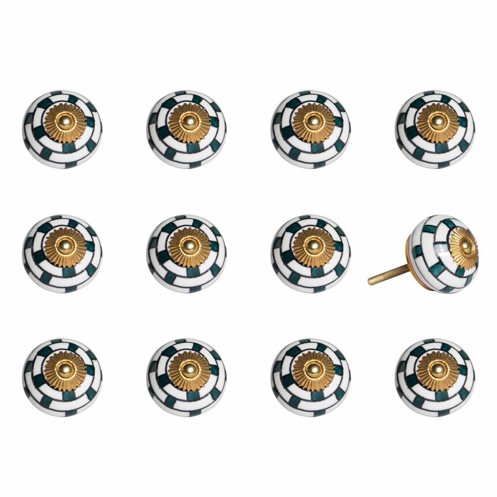 Twelve ceramic cabinet knobs with white, black, and gold geometric patterns on a white background.