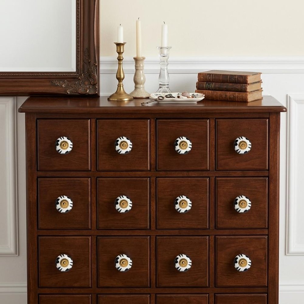 Set of Twelve White Teal And Gold Geometric Ceramic Drawer Pull Knobs in a home interior