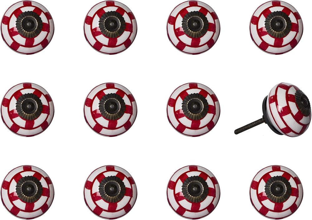 Twelve red and white geometric ceramic drawer pull knobs with metal screws on a white background.