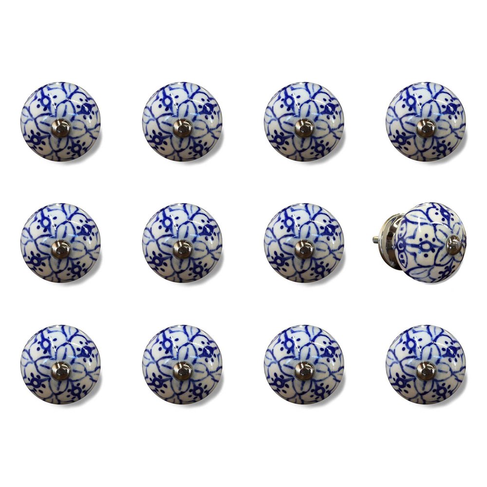 Twelve blue and white ceramic drawer knobs with a floral pattern on a white background.