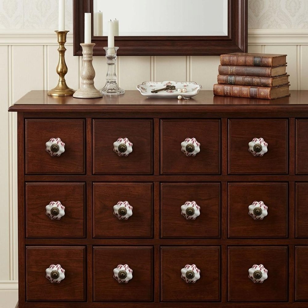 Set of Twelve Burgundy White And Copper Floral Ceramic Drawer Pull Knobs in a home interior