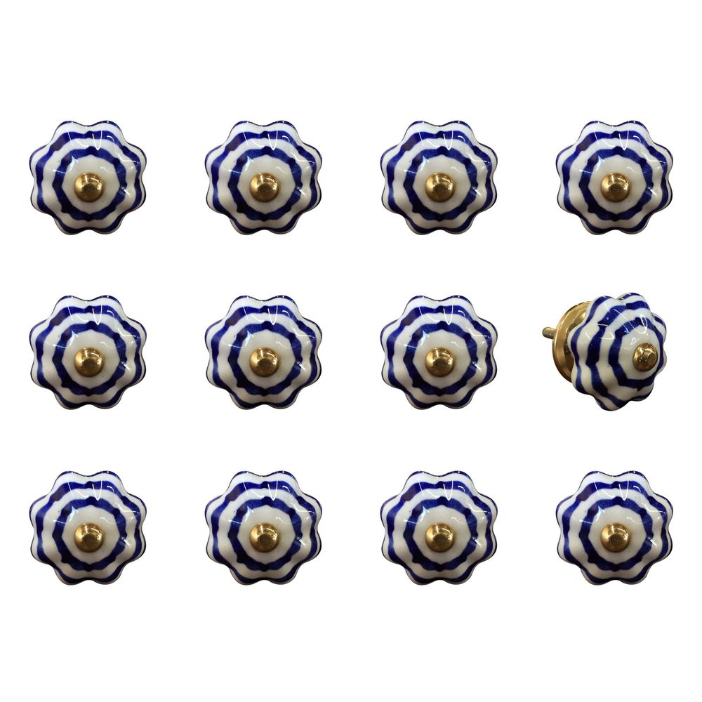 Set of twelve blue and white floral ceramic drawer knobs with copper accents on a white background.