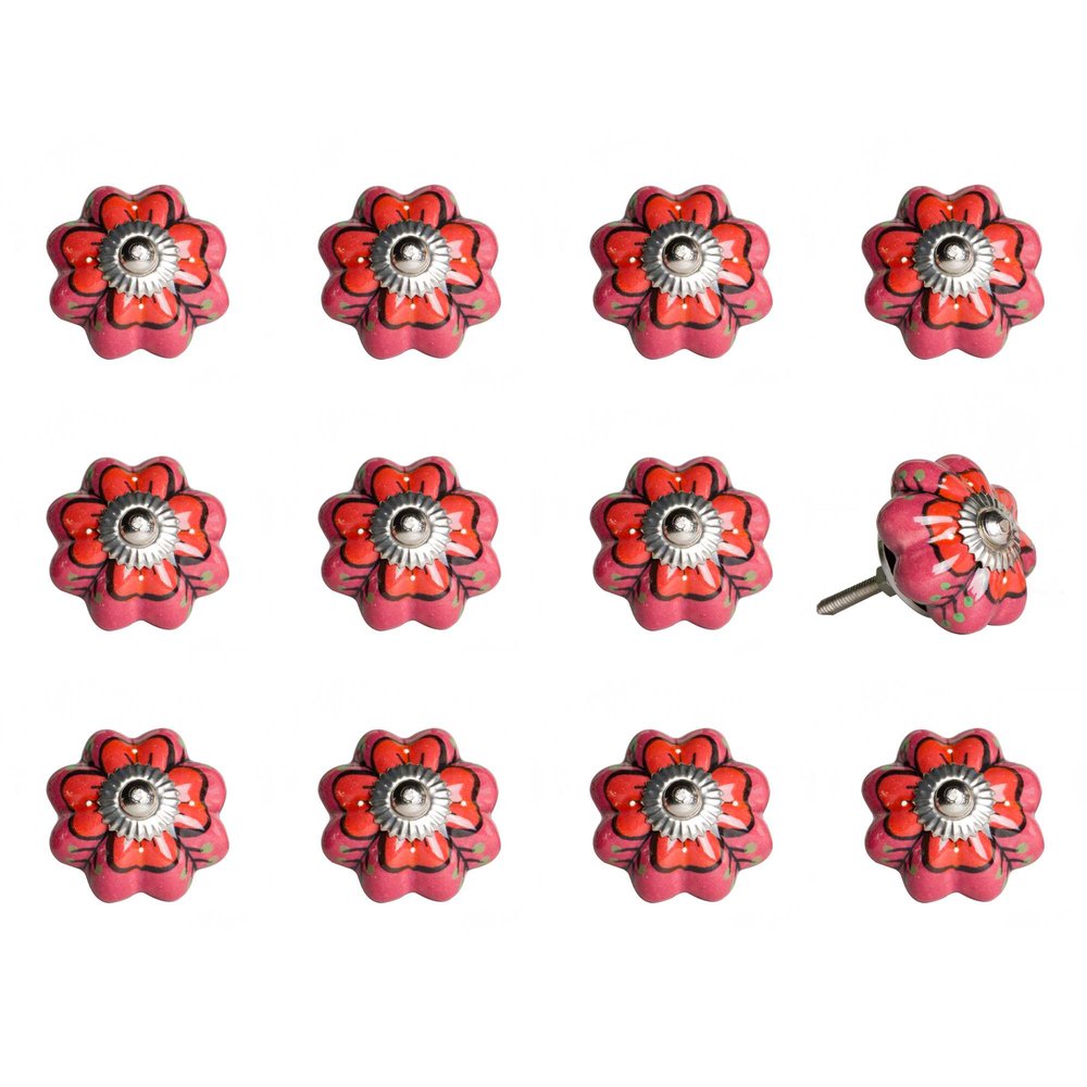Twelve red and pink floral ceramic drawer knobs with green accents on a white background.