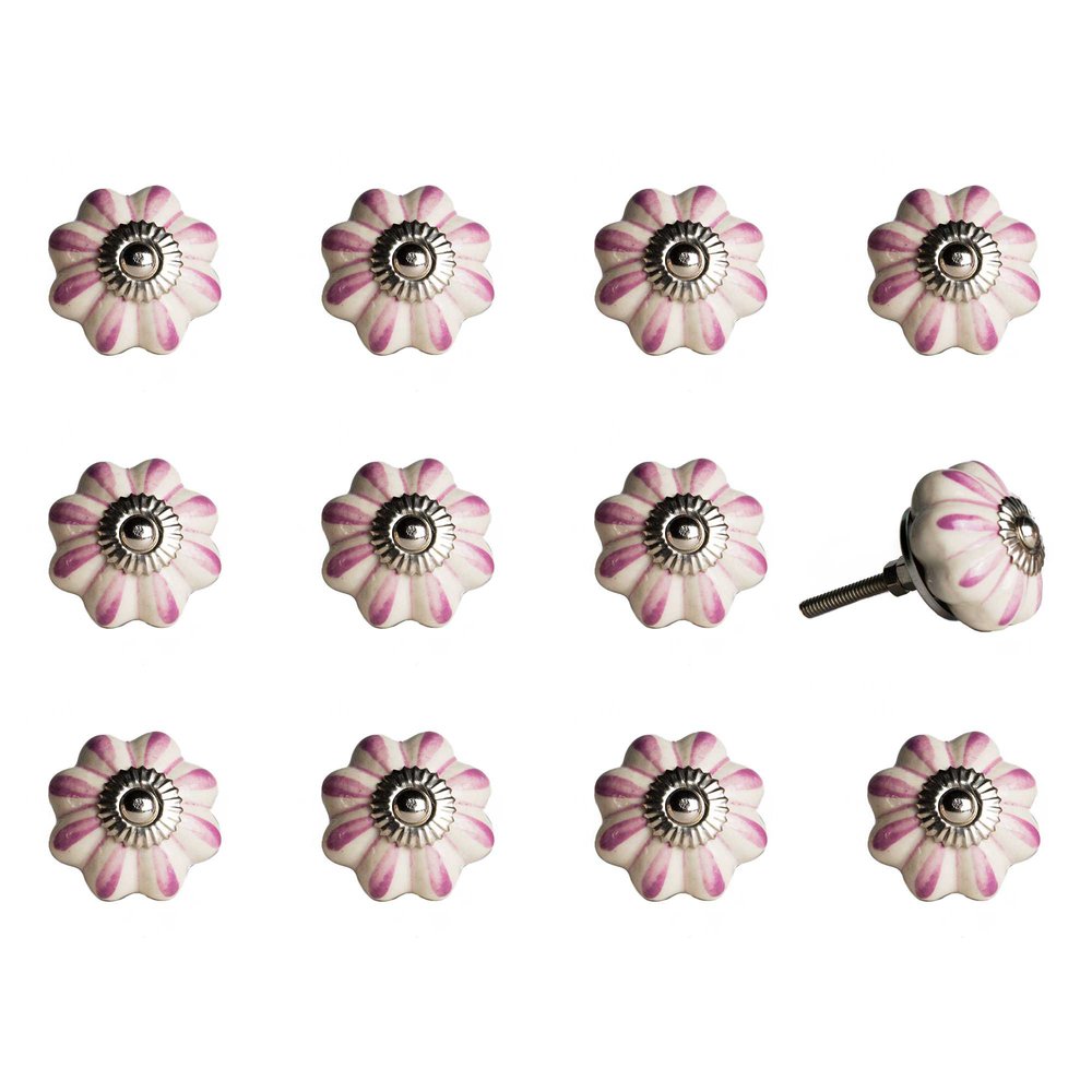 Set of twelve pink and cream ceramic flower-shaped drawer knobs with silver centers on a white background.