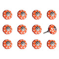 Set of Twelve Orange White And Silver Floral Ceramic Drawer Pull Knobs on a white background