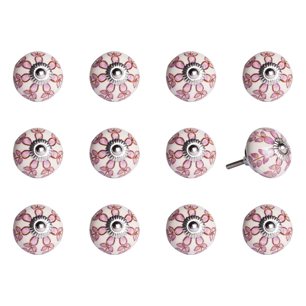 Twelve ceramic drawer knobs with pink and burgundy floral patterns on a white background.