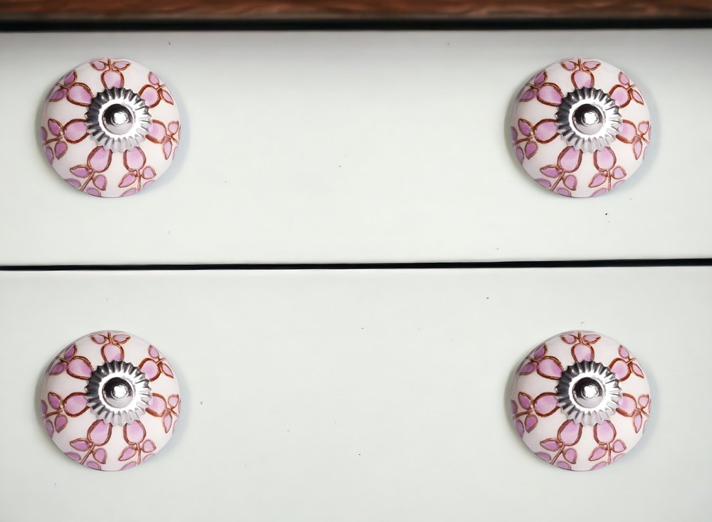 Set of Twelve Pink White And Burgundy Floral Ceramic Drawer Pull Knobs in a home interior