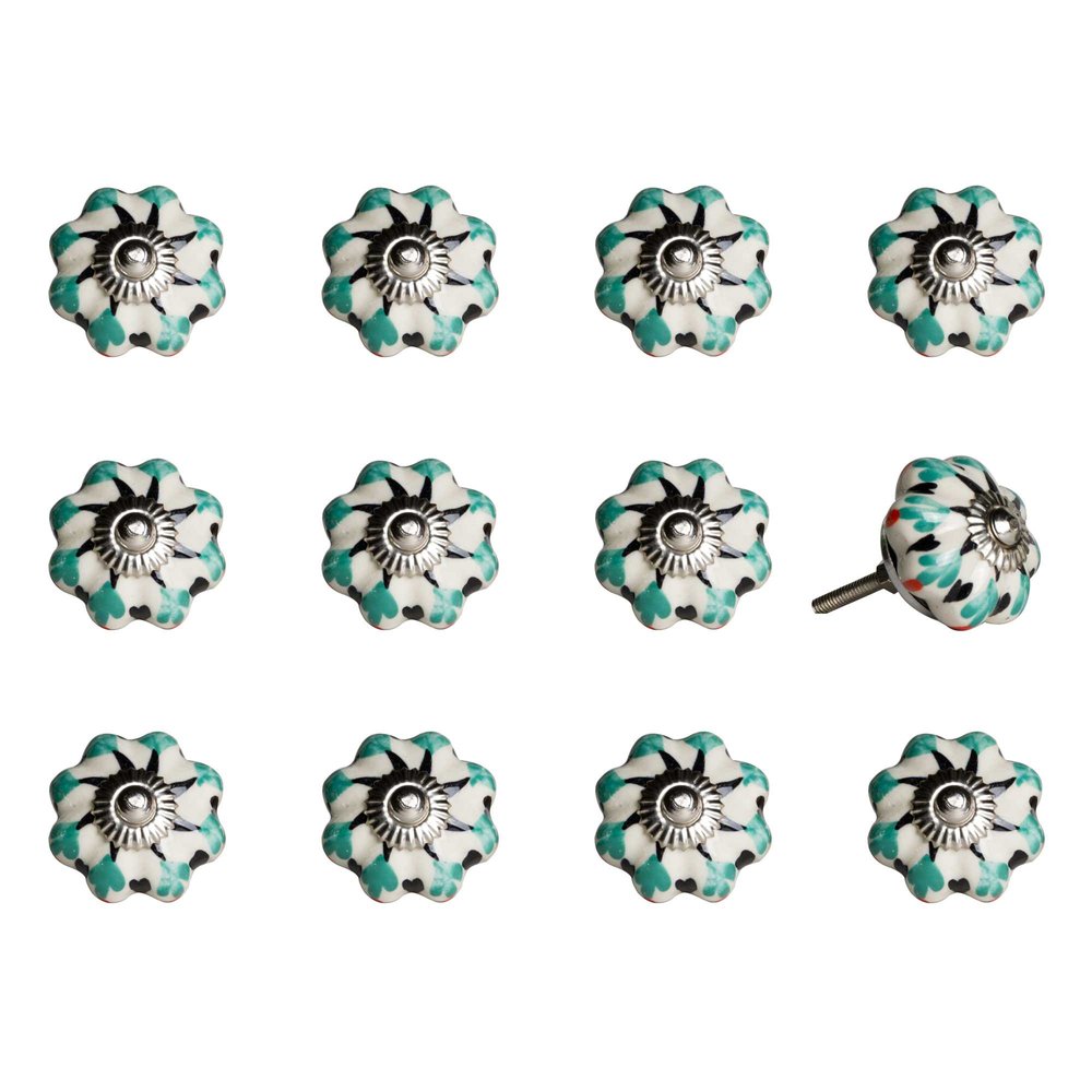 Twelve green, silver, and white ceramic drawer knobs with a geometric floral design on a white background.