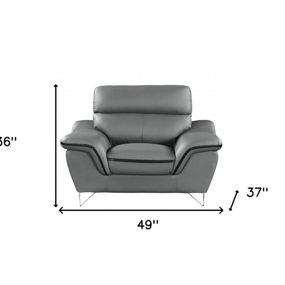 49" Gray And Silver Leather Match Convertible Chair. Accent chair isolated on a plain white background, showing a silver leather surface.