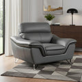 49" Gray And Silver Leather Match Convertible Chair styled in a furnished interior on a tiled floor against a light gray wall.
