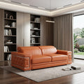 89" Beige Italian Leather Sofa With Silver Legs in a home interior