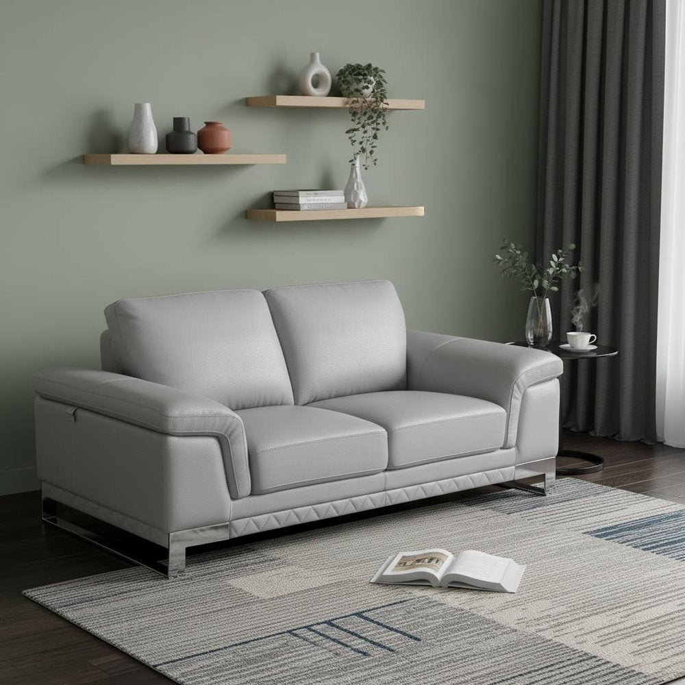 73" Light Gray And Silver Genuine Leather Loveseat in a home interior