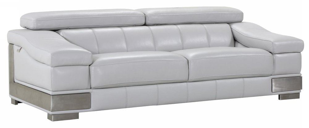 Light gray Italian leather sofa with silver metal accents and legs, shown against a white background.