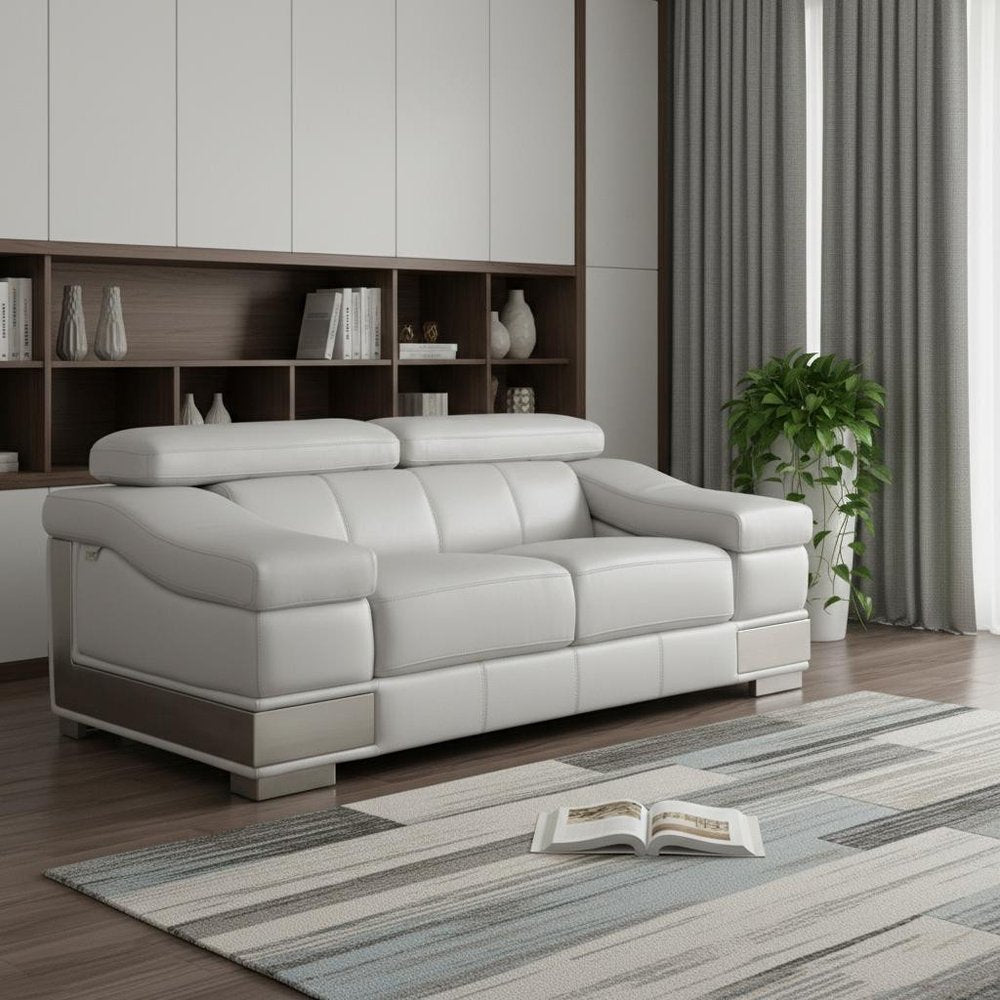73" Light Gray And Silver Genuine Leather Love Seat in a home interior