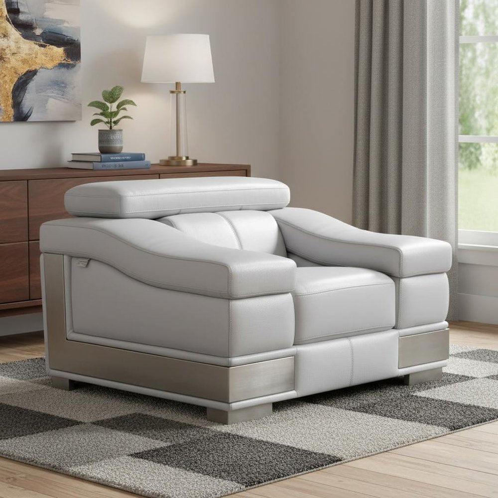 49" Gray Genuine Leather Arm Chair styled in a furnished interior on a tiled floor against a tan wall.