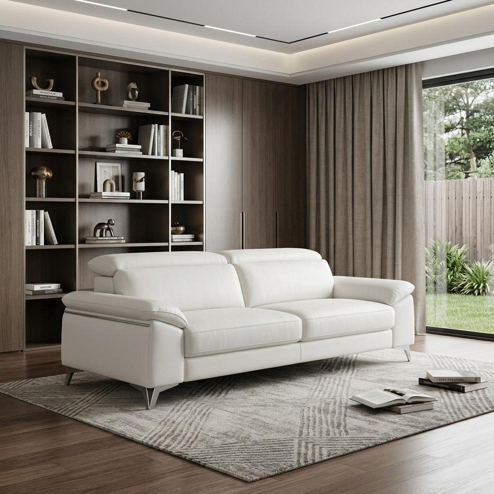 87" White Italian Leather Sofa With Silver Legs in a home interior