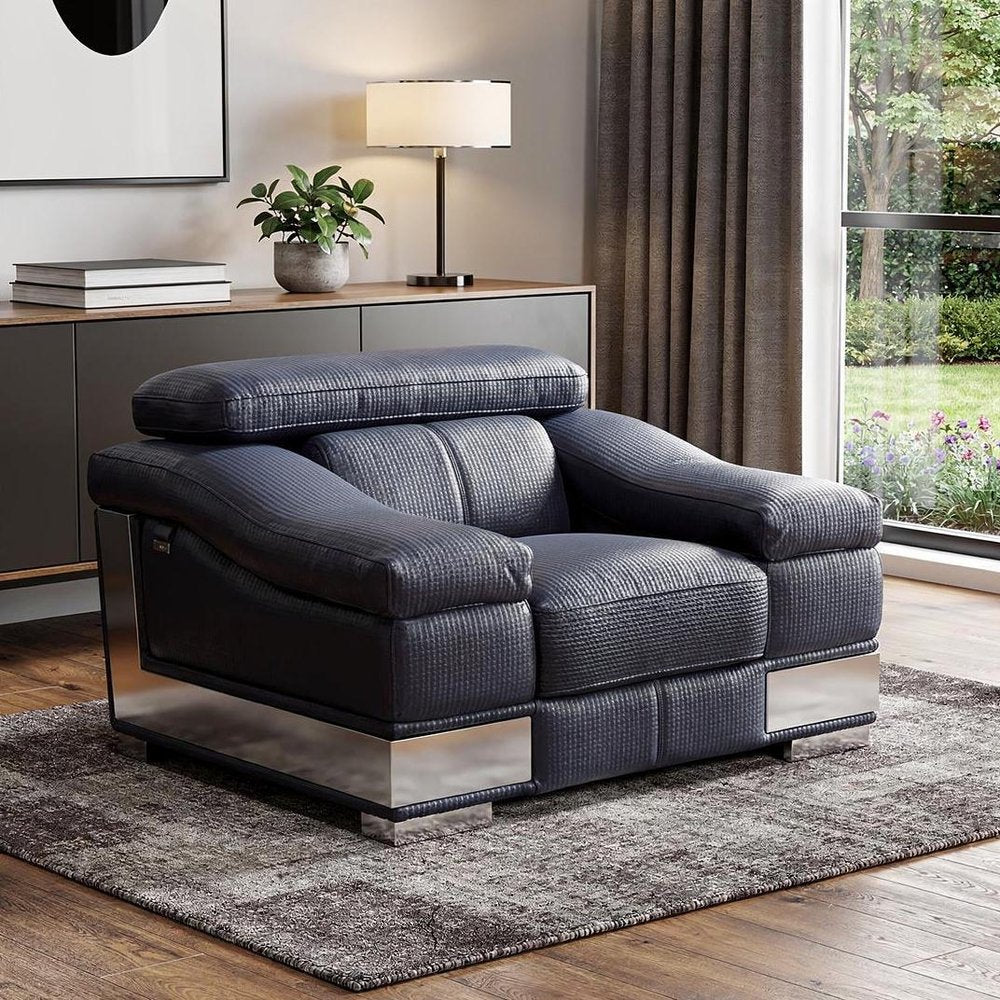 49" Gray Genuine Leather Arm Chair styled in a furnished interior on a dark wood floor against an off-white wall.