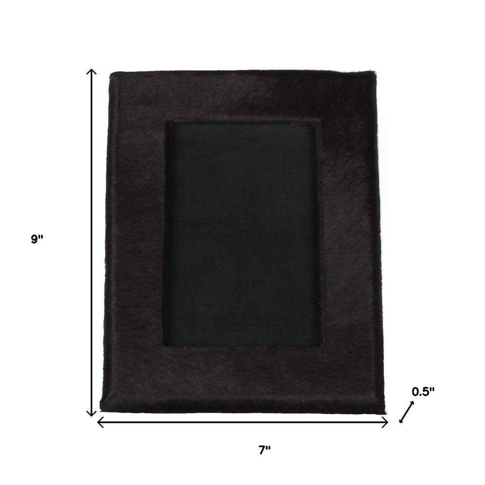 4" x 6" Black Cowhide Picture Frame with Mat. Picture frame isolated on a plain white background, in a black finish.