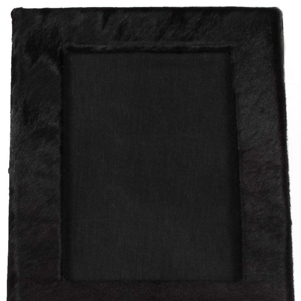 Close-up of 5" x 7" Black Cowhide Hanging & Tabletop Picture Frame with Mat showing the black texture.
